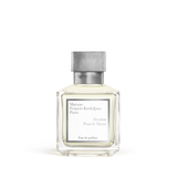 Maison Francis Kurkdjian Absolue Pour le Matin Eau de Parfum in a clear glass bottle with pale yellow liquid and a grey metal
