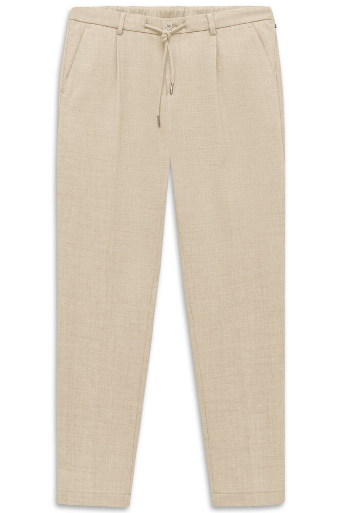 Ecru men's combi trousers with drawstring waist, front pleats, and side slash pockets.