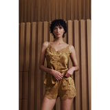 Hazelnut satin camisole and shorts set. Camisole has a lace-trimmed V-neckline and floral lace appliqué. Shorts have lace app