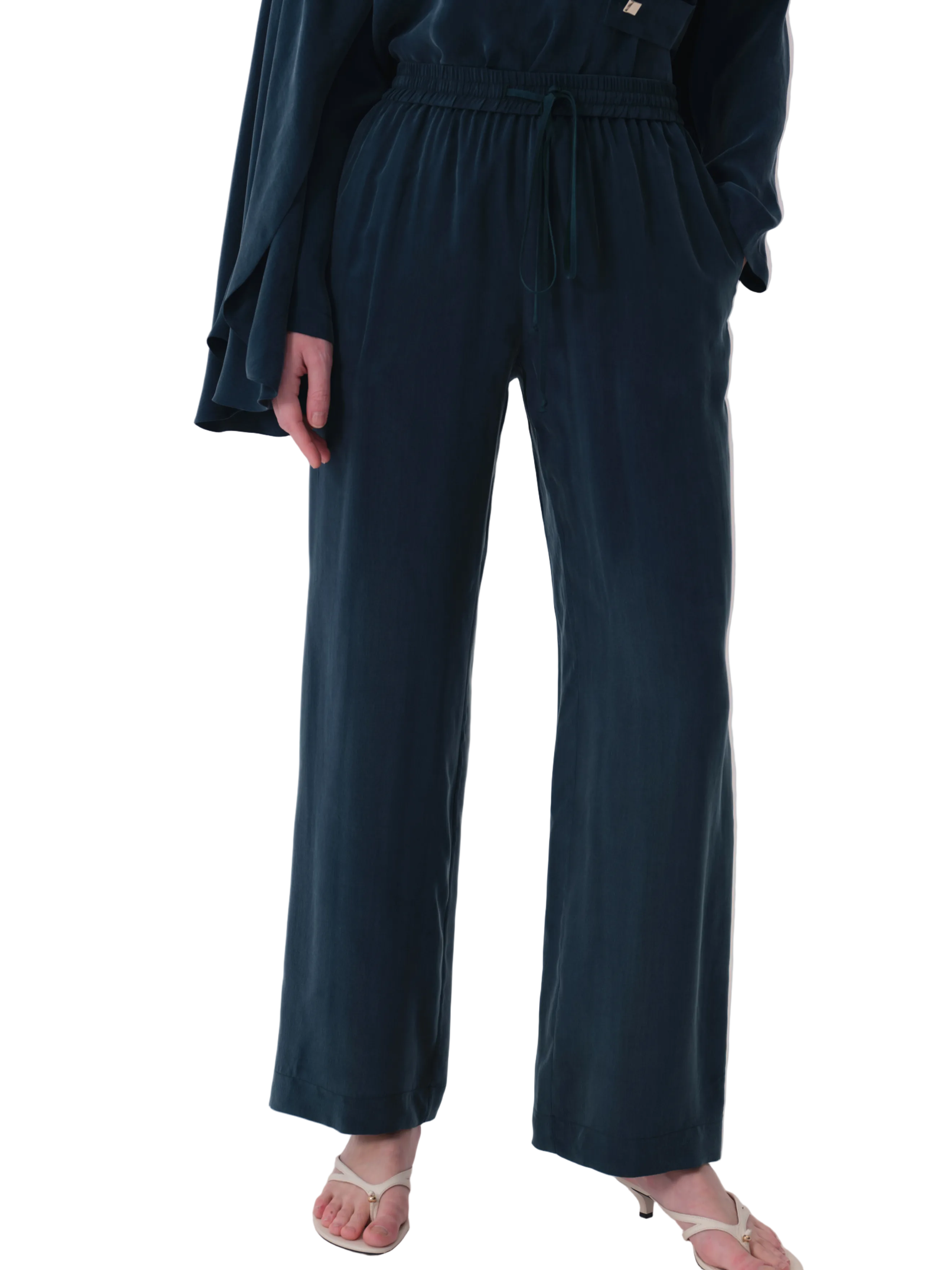 Petroleum wide leg trousers with an elasticated drawstring waistband and side pockets.