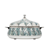 Casa Blu insulated serving casserole dish featuring a teal and white Lily of the Valley floral pattern with polished chrome handles and lid knob.