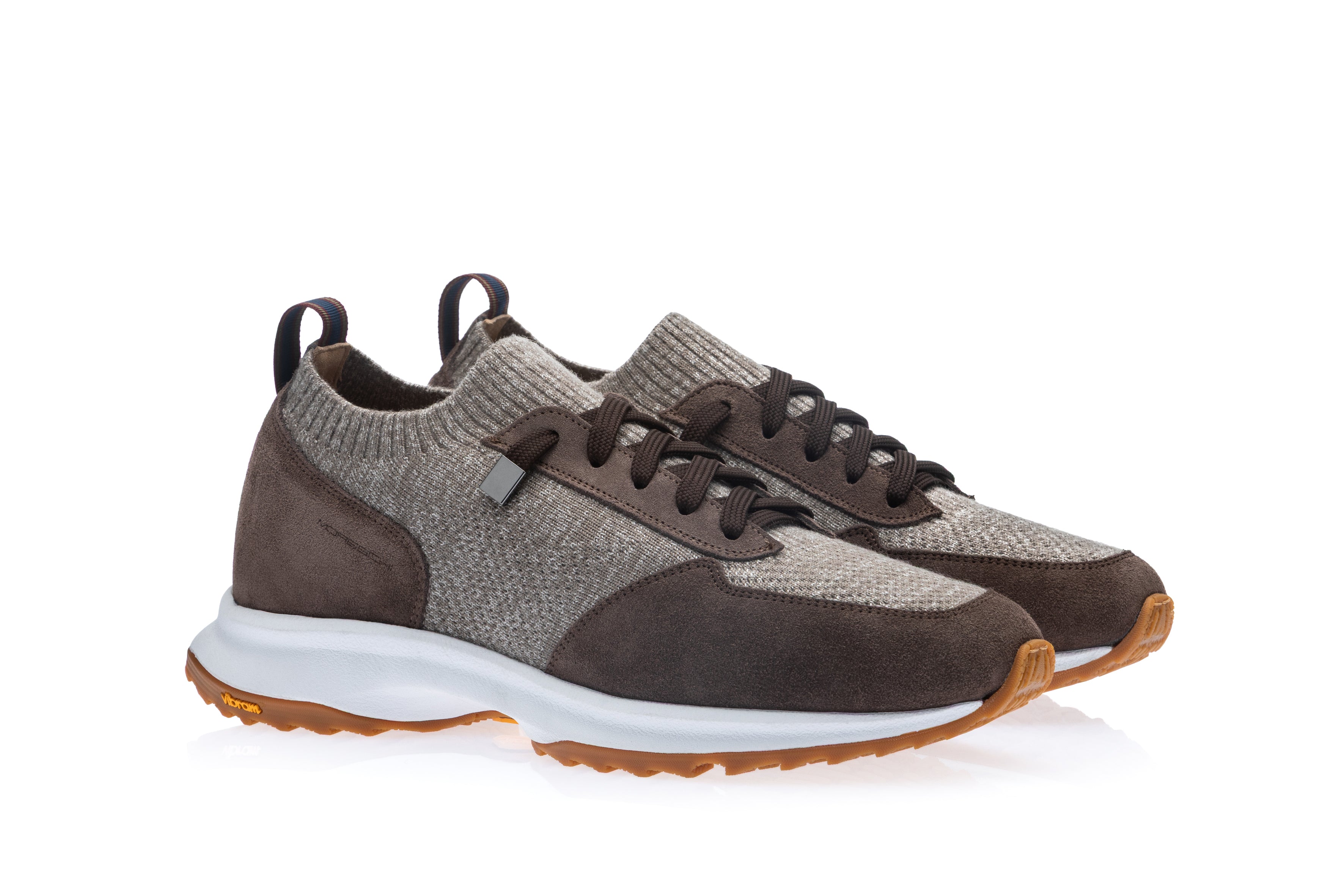 Nocciola brown suede-like and light brown knit sneakers with dark brown laces, white midsoles, and tan rubber outsoles.