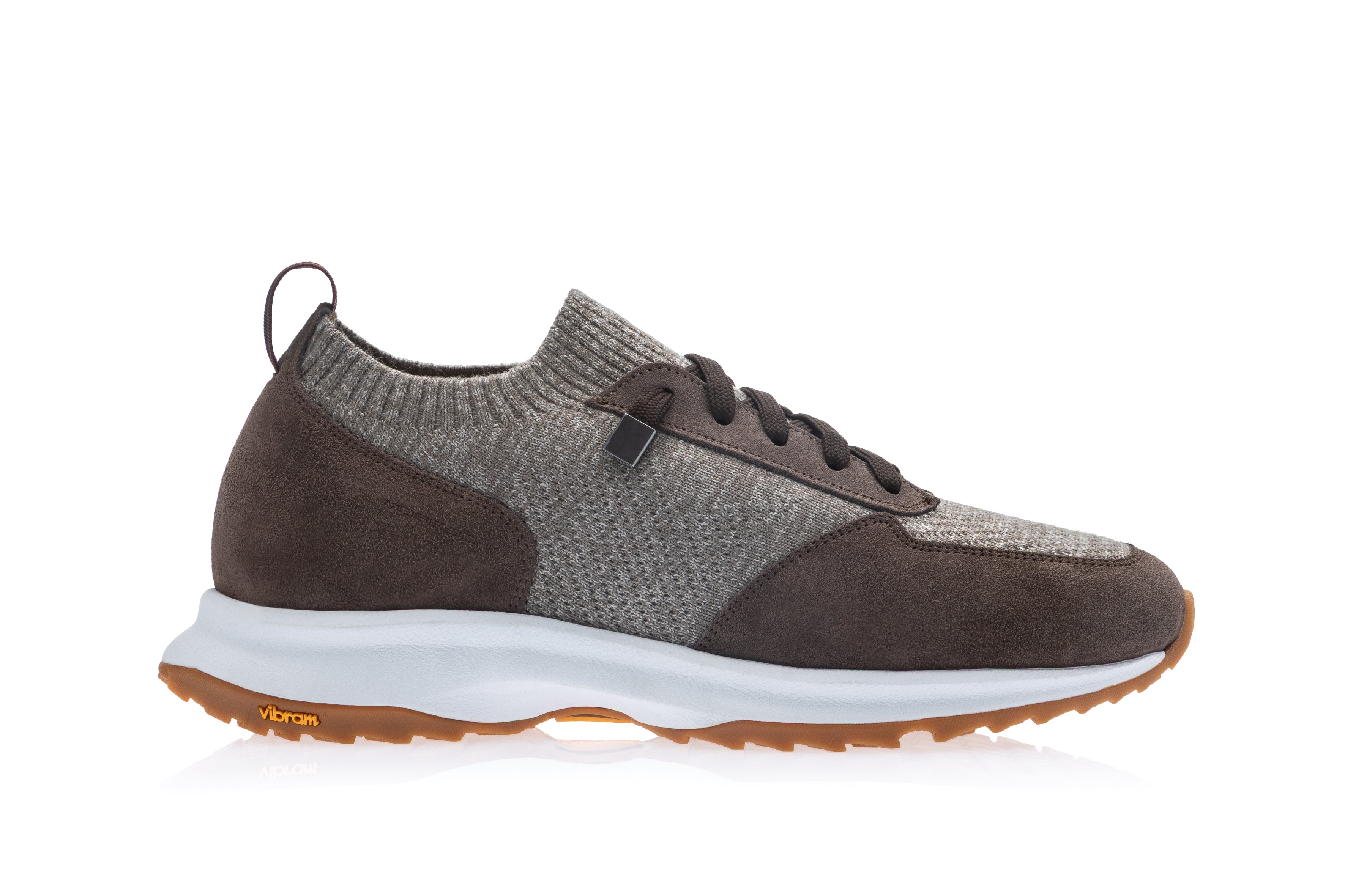 Side view of a Moreschi low-top trainer in nocciola brown, featuring knit fabric and suede panels with a white midsole and br