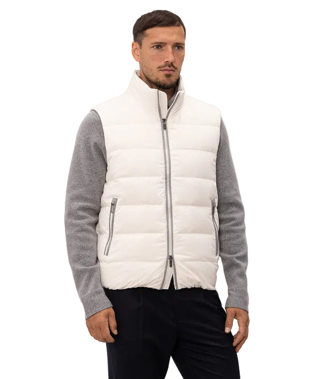 Luminous beige men's padded vest with a stand collar, full-zip front, and two zippered side pockets.