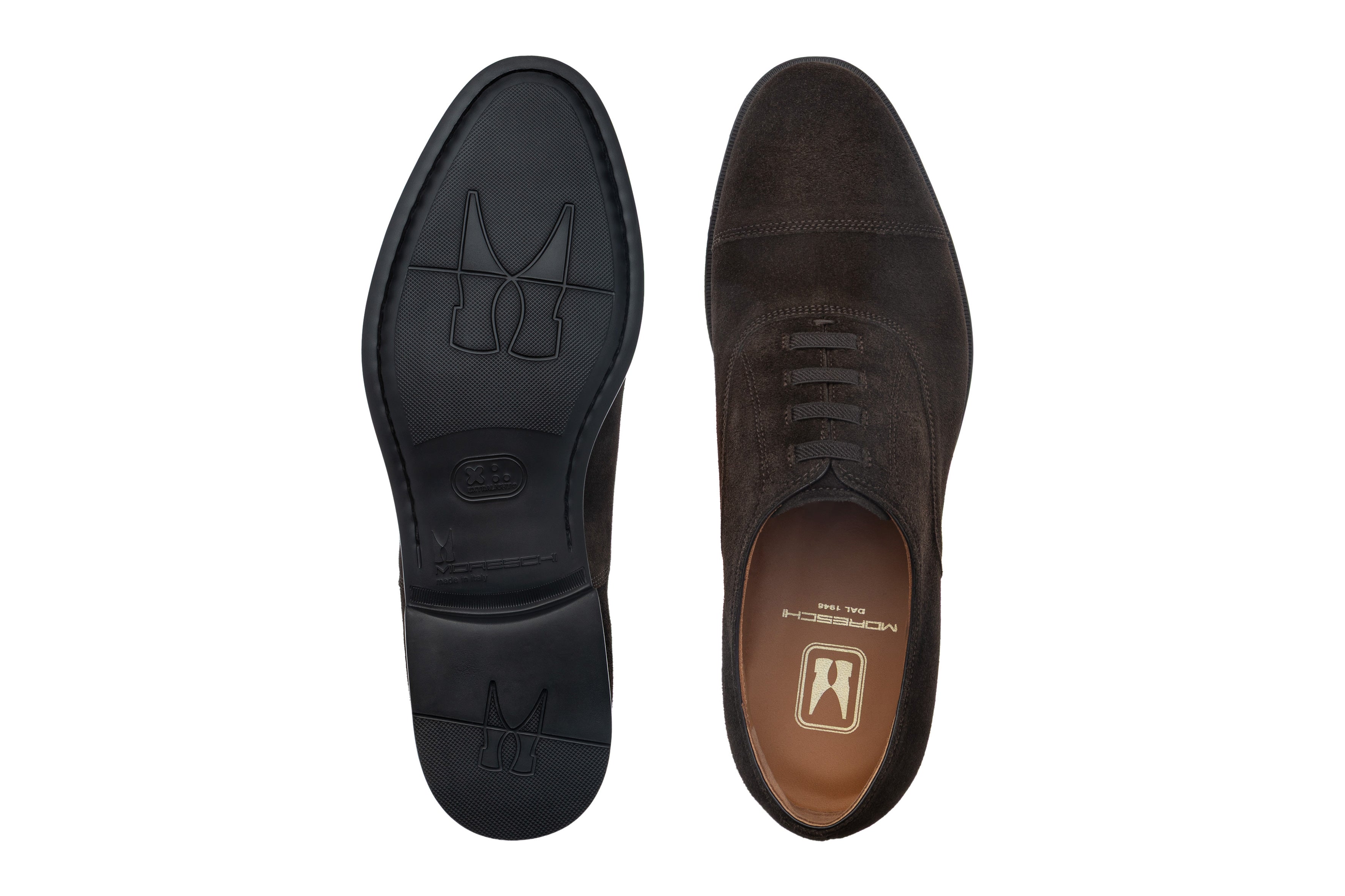Dark brown suede cap-toe Oxford shoe with closed lacing, shown alongside its black rubber sole with textured grip and Moresch