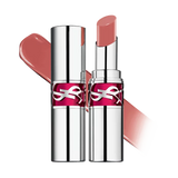 Two silver-toned lipsticks with fuchsia YSL logo bands. One is open, showing a glossy peachy-pink bullet and a matching swatc
