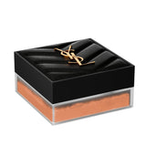 Square YSL Hyper Blur Powder compact with a black quilted lid and gold-toned logo, revealing peach-toned powder.