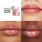 A clear glass tube of peachy-pink lip gloss with a silver-toned YSL logo cap. The applicator wand with gloss is next to it.