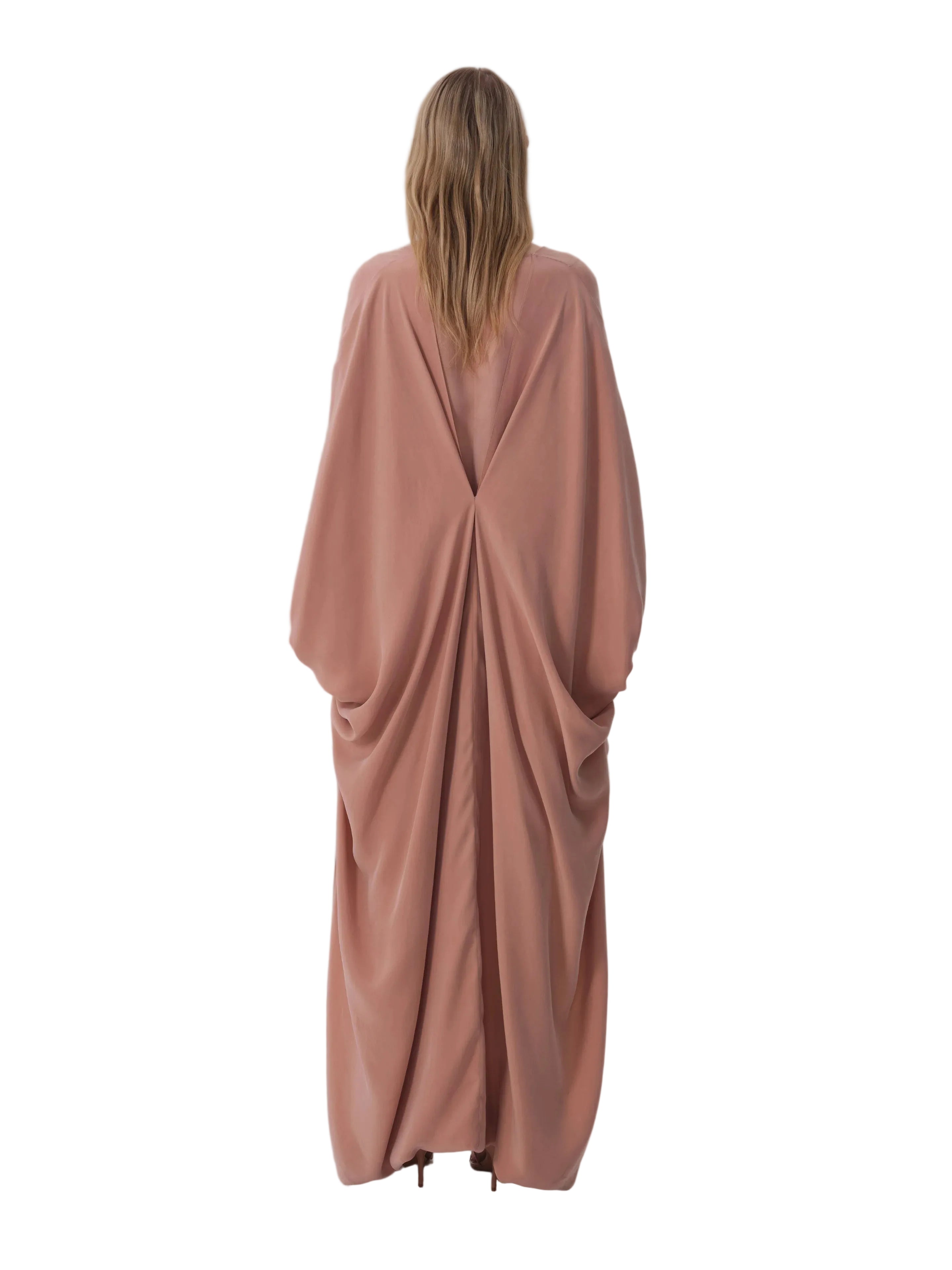 Dark beige abaya with a deep V-shaped back pleat, wide draped sleeves, and a voluminous, flowing silhouette.