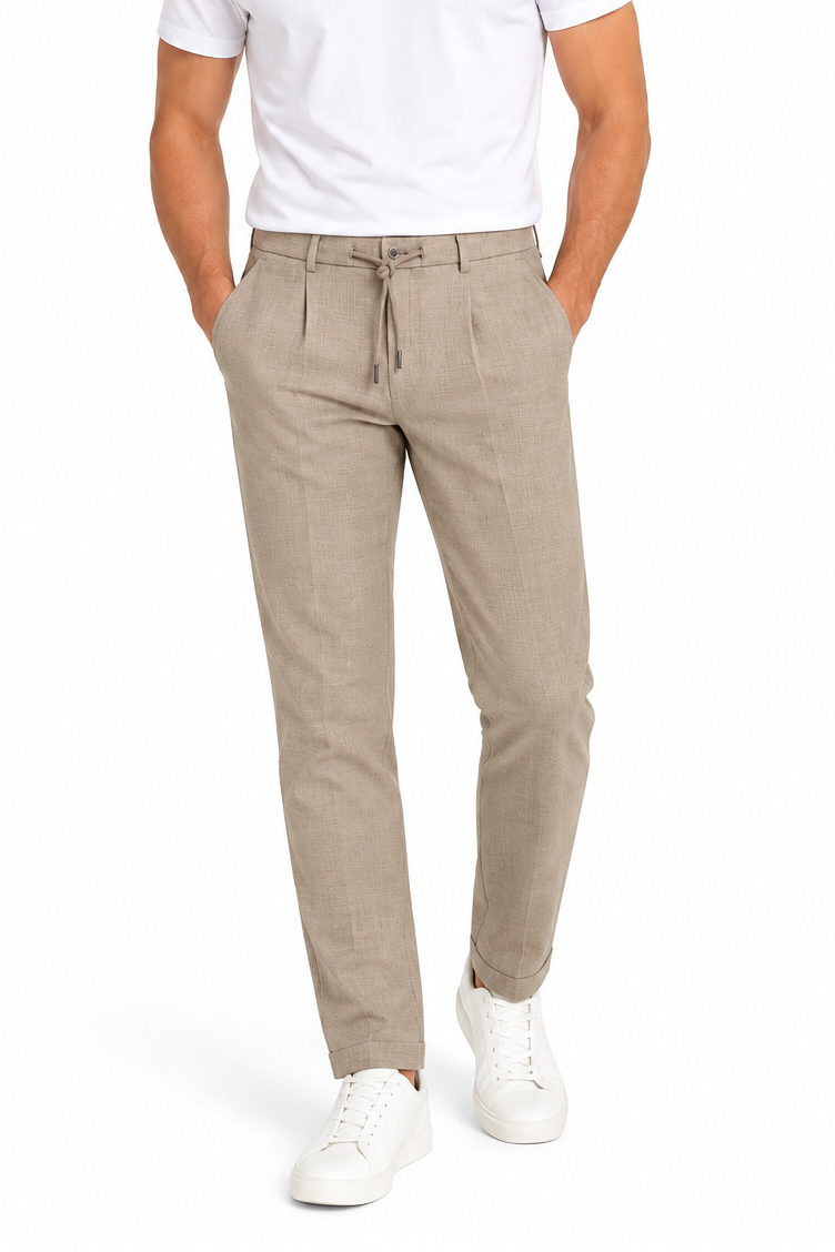 Beige combi trousers with a drawstring waist, belt loops, single pleats, and cuffed hems.