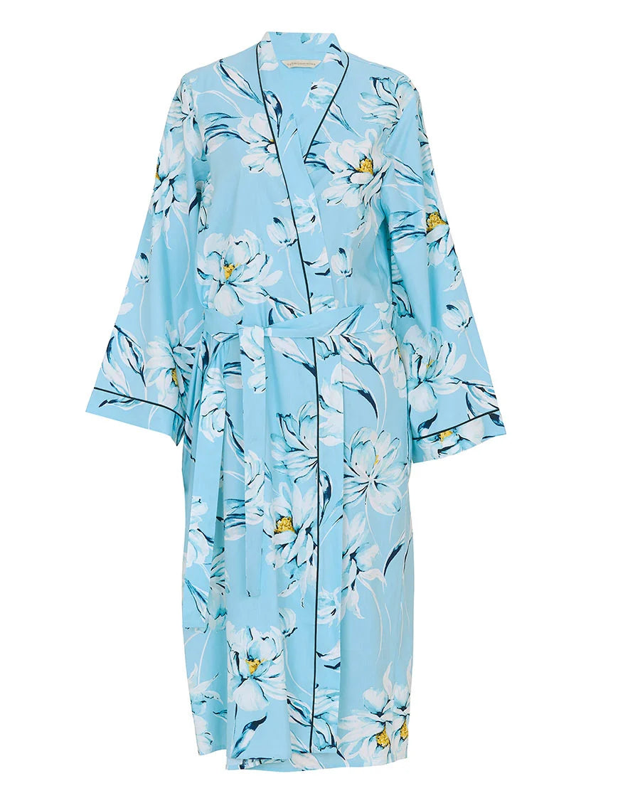 Light blue woven dressing gown with white flowers, yellow centers, blue leaves, black piping on lapels and cuffs, and a self-