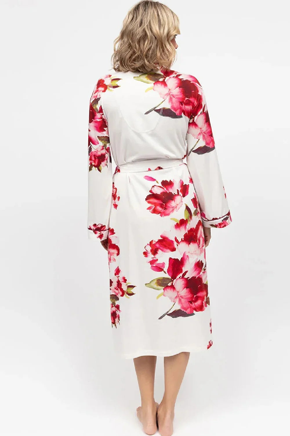 White jersey long dressing gown with ox blood and pink floral print, green leaves, and a matching tie belt at the waist.
