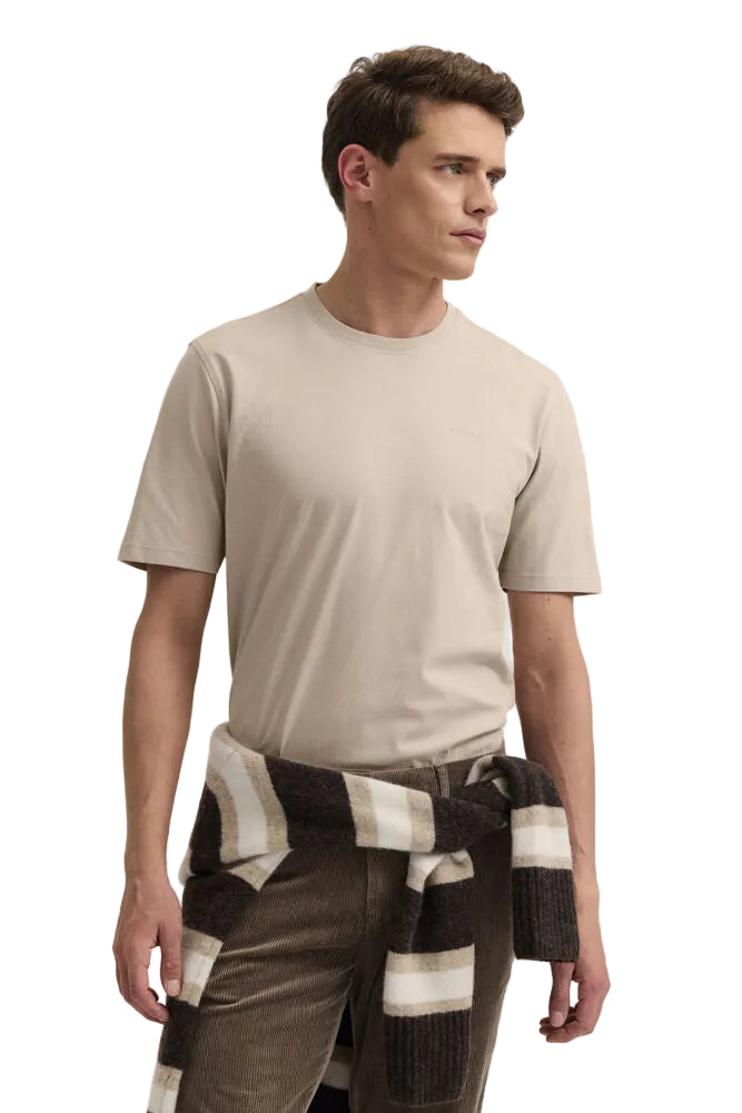 Beige men's crew neck T-shirt with short sleeves and a subtle logo on the left chest.