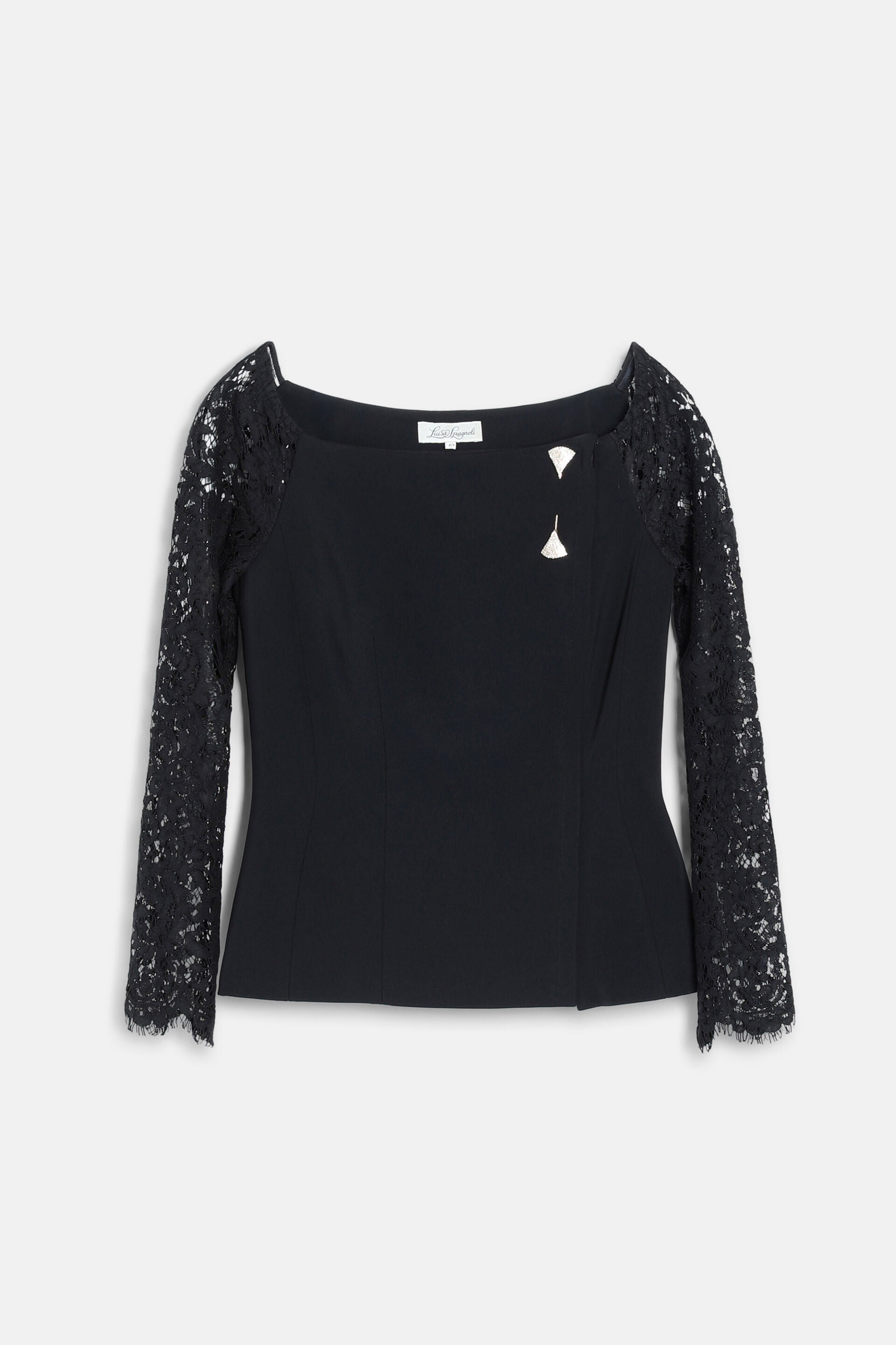 Black jacket with square neckline, long lace sleeves, and a fitted body. Features two silver-toned fan-shaped pins on the che