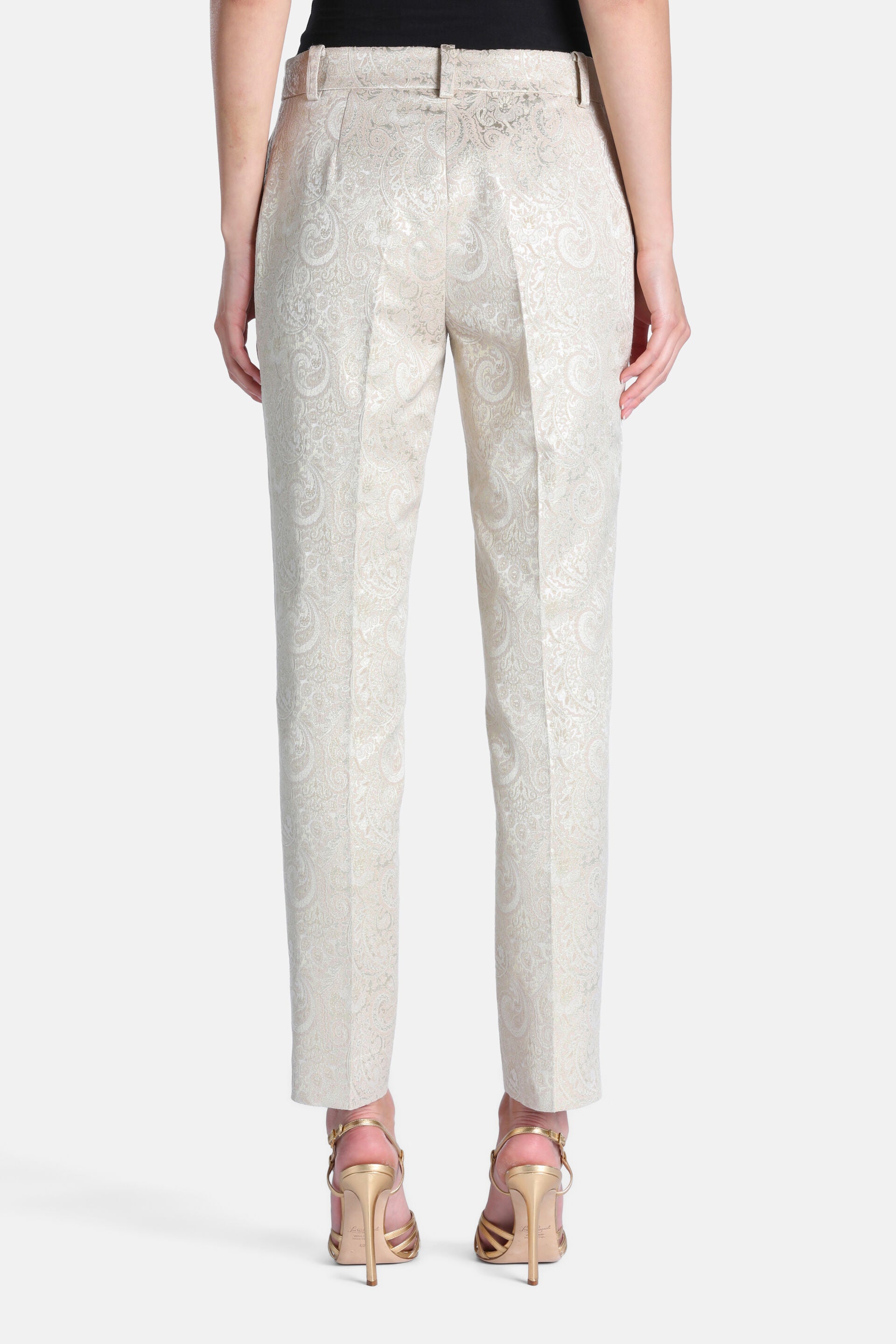 Platinum-toned jacquard trousers with a subtle paisley pattern. Tailored, straight-leg, cropped design with belt loops.