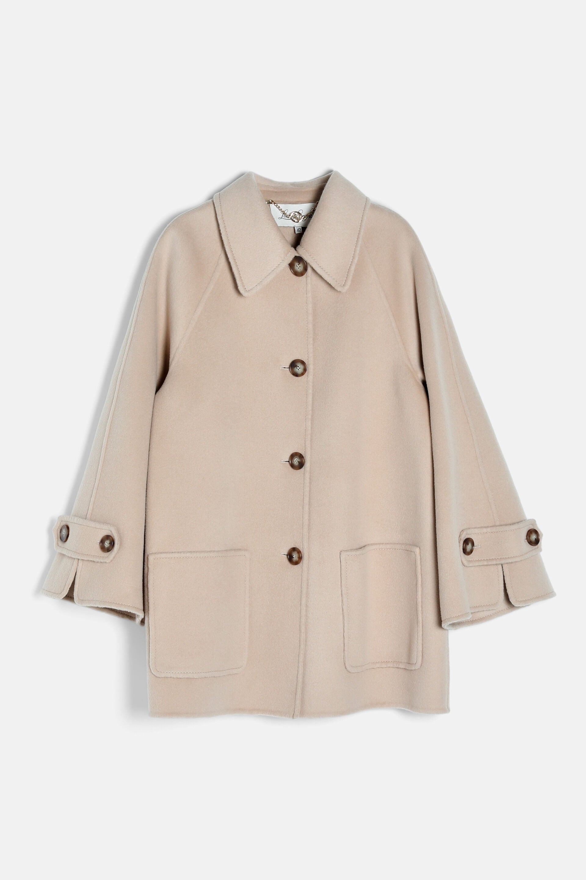 Light beige wool-blend coat with a pointed collar, four brown buttons, raglan sleeves with buttoned cuff tabs, and two front