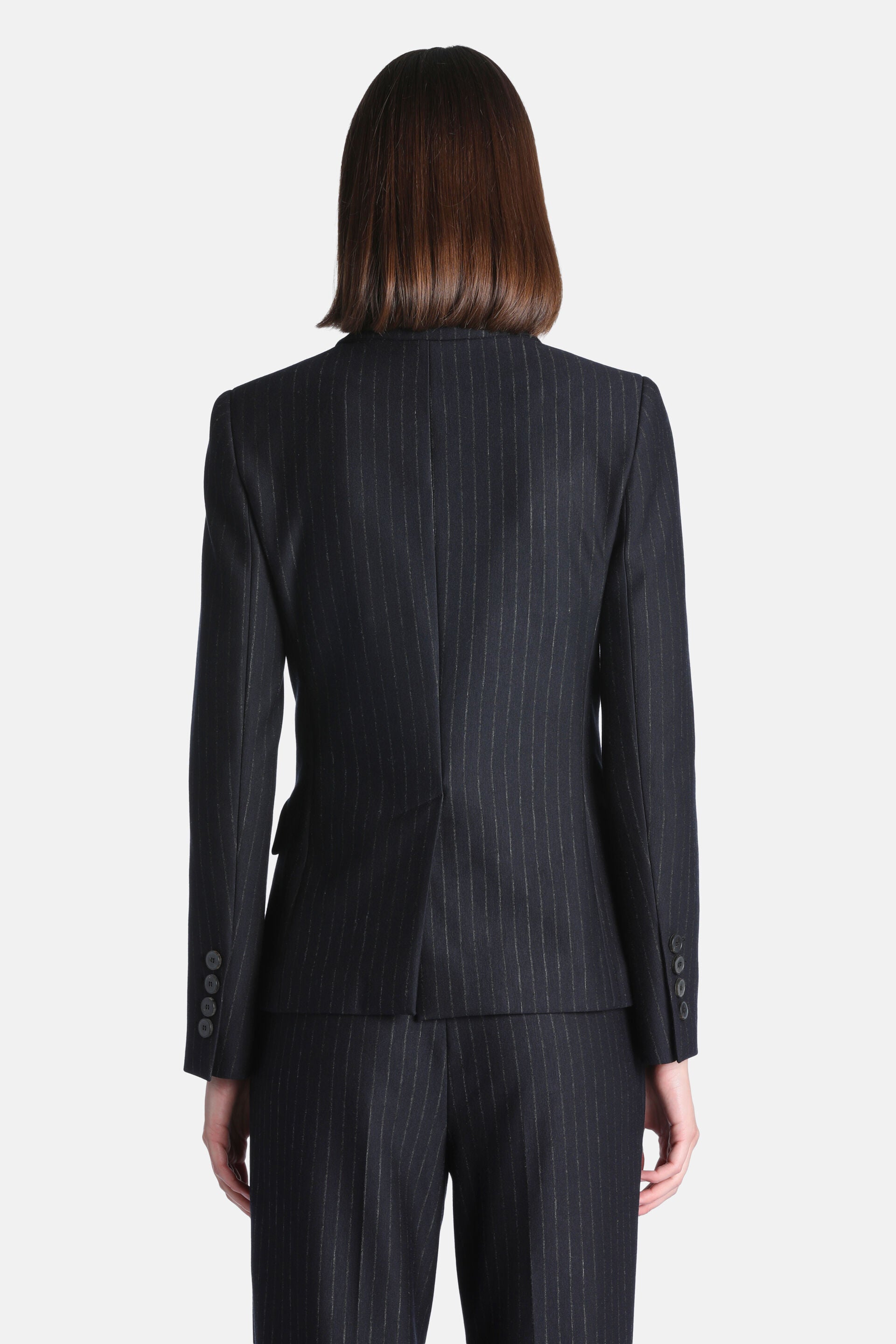 Blue Notte pinstriped blazer, back view. Features two vertical seams on the back and four dark buttons on each cuff.