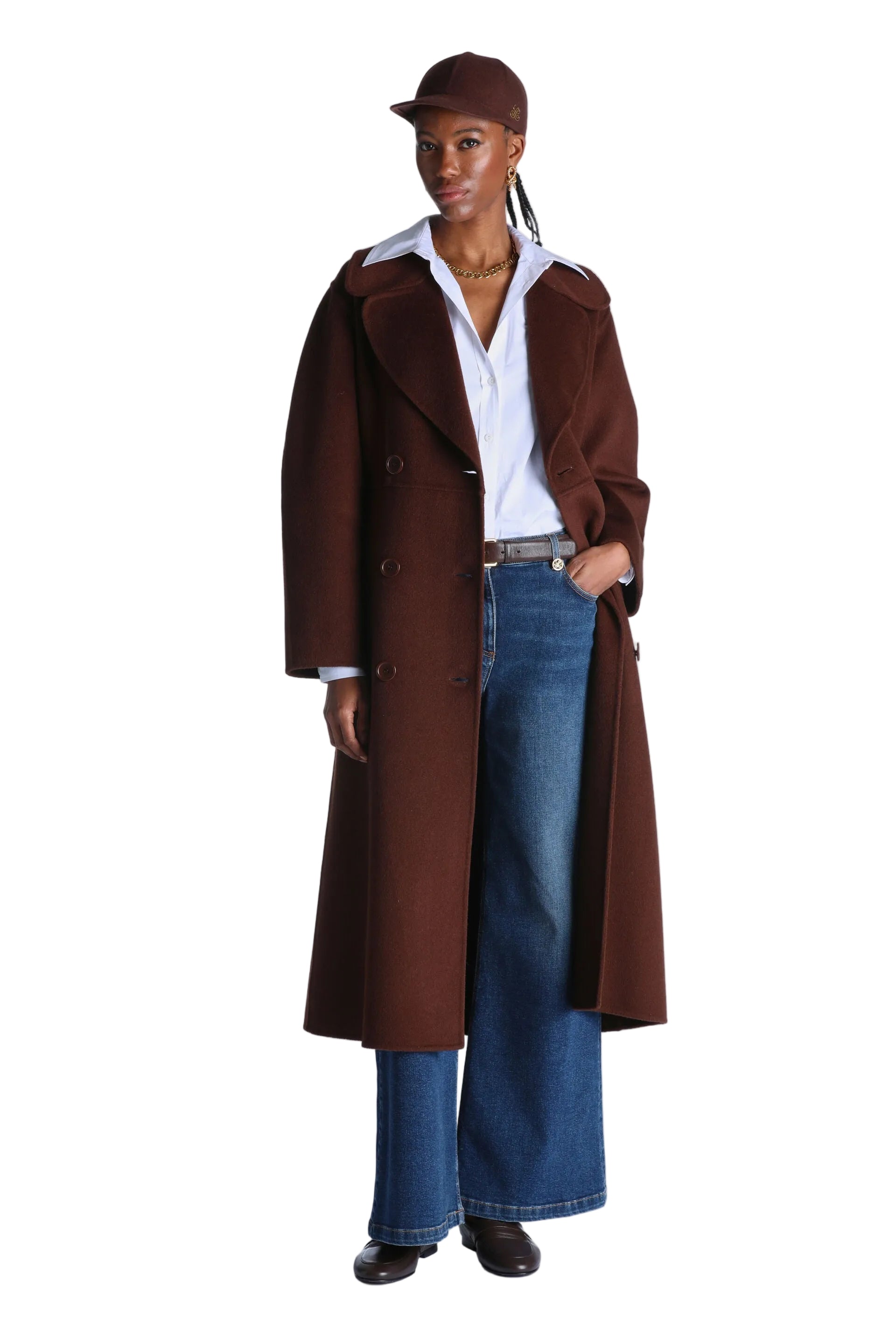 Long, dark brown double-breasted coat with wide lapels, two visible buttons, and flap pockets. Made of a thick, soft material
