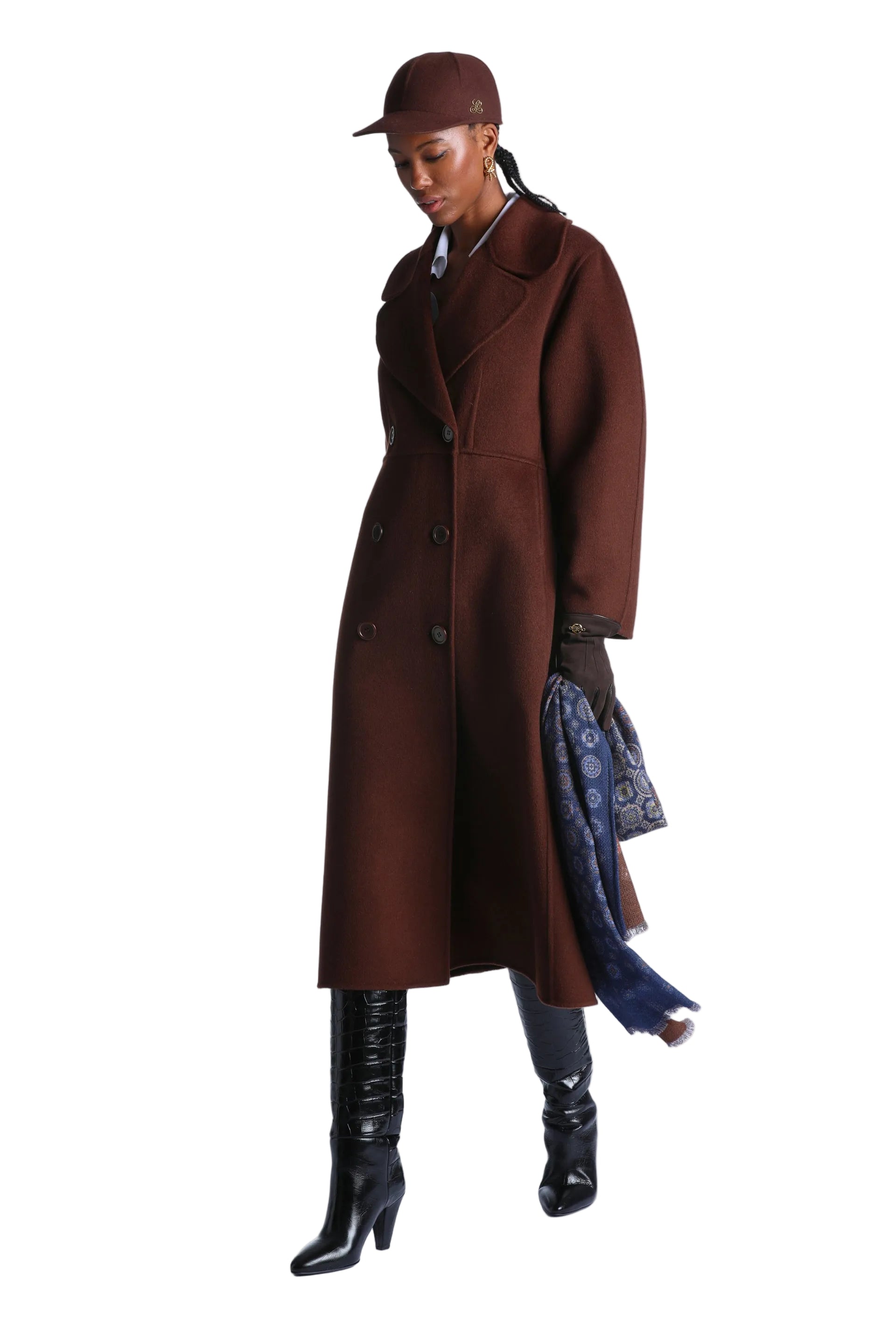 Brown double-breasted longline coat with wide notched lapels and front welt pockets.