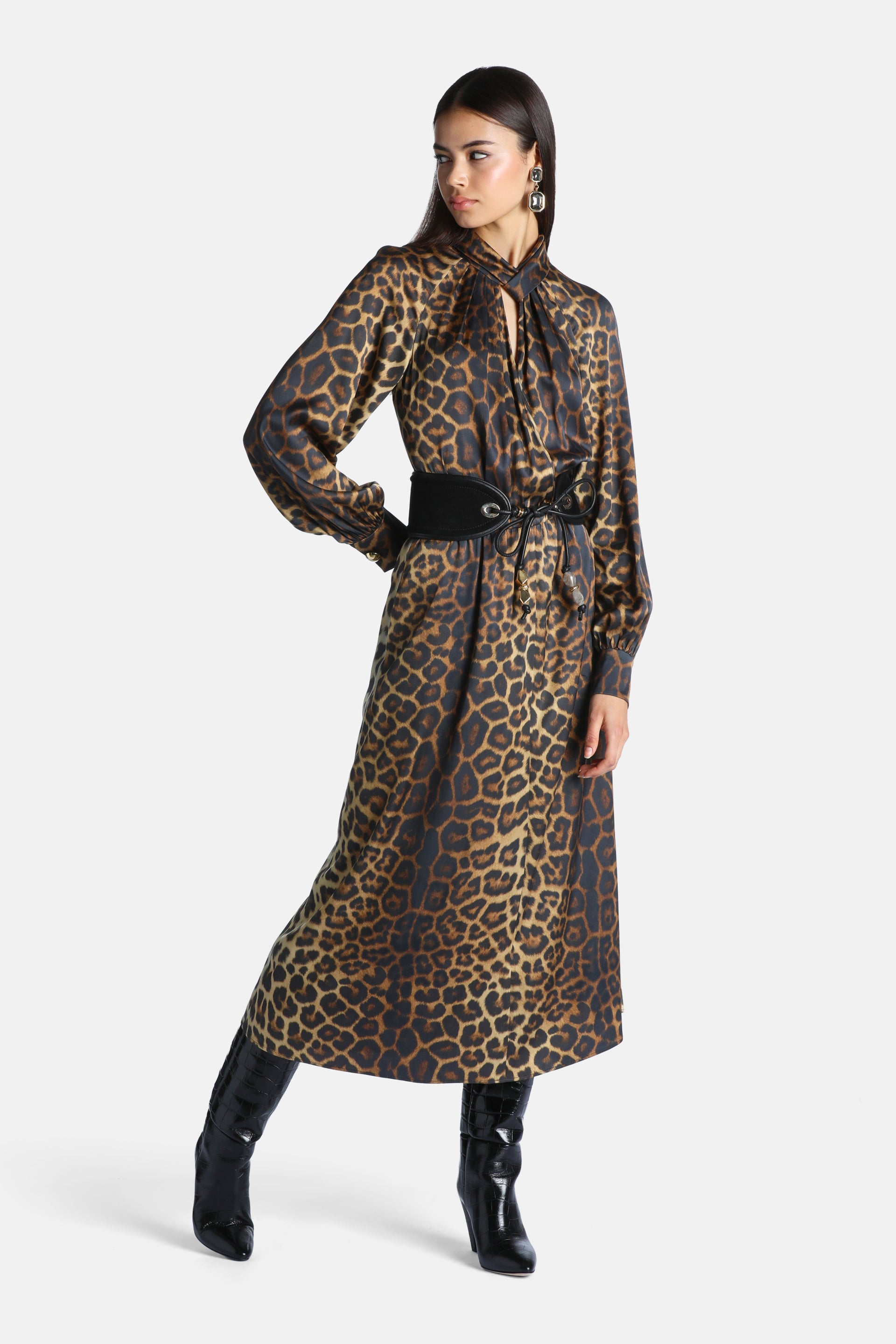 Leopard print midi dress with a high gathered neckline, keyhole cutout, voluminous long sleeves, and a black tie-waist belt.