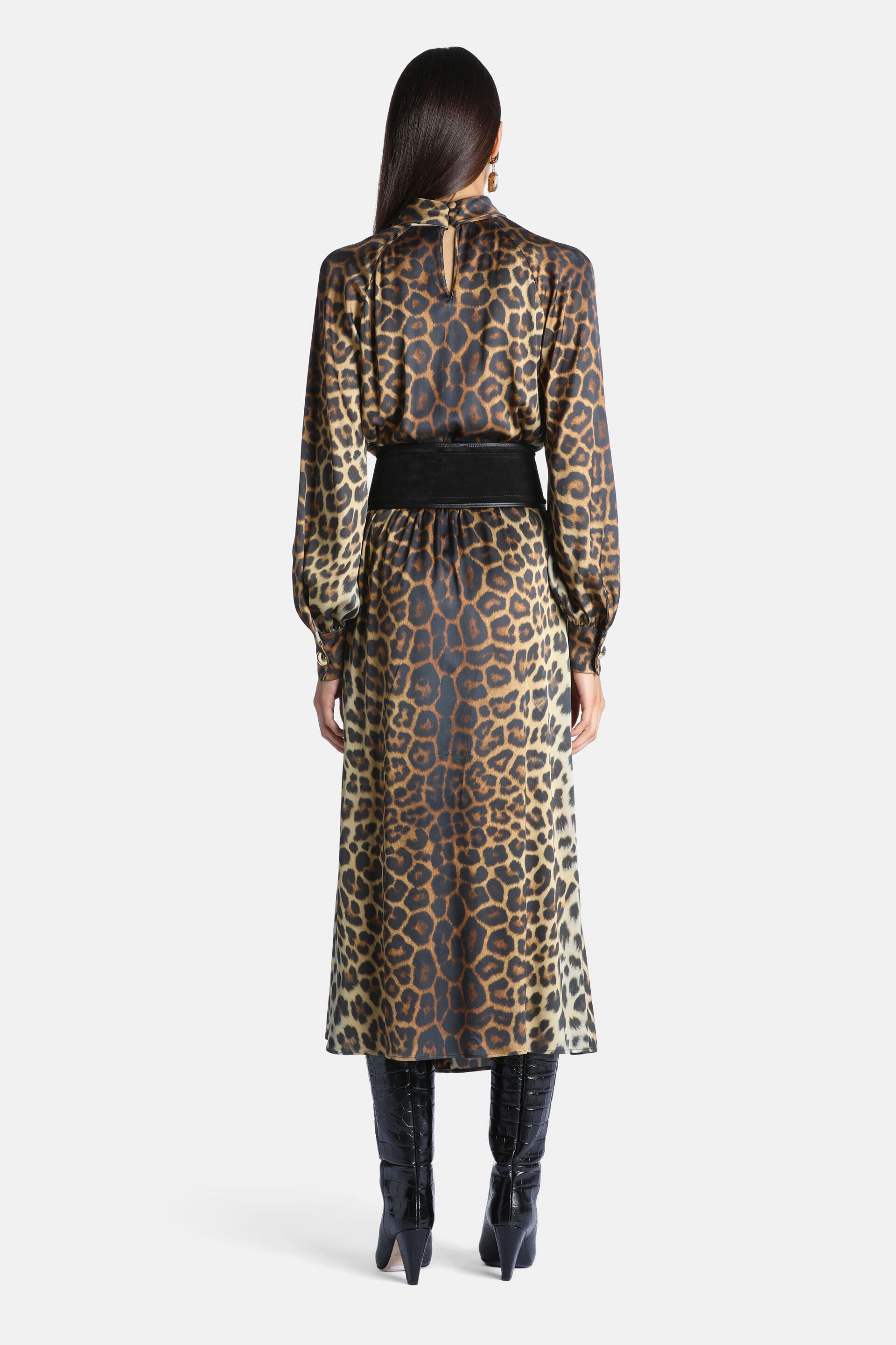 Leopard print midi dress with a high collar, keyhole back, long gathered sleeves, and a wide black waist belt.
