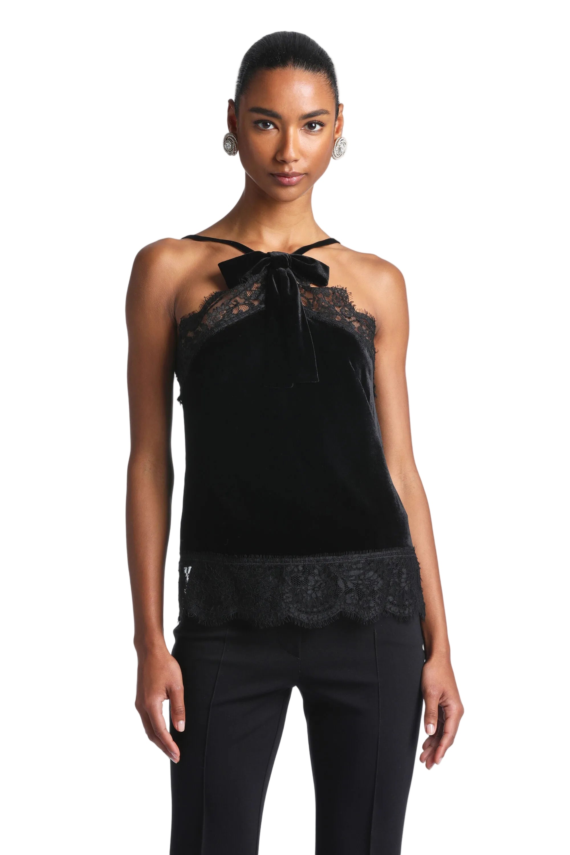 Black velvet halter top with thin straps, a front bow, and scalloped lace trim along the bust and hem.