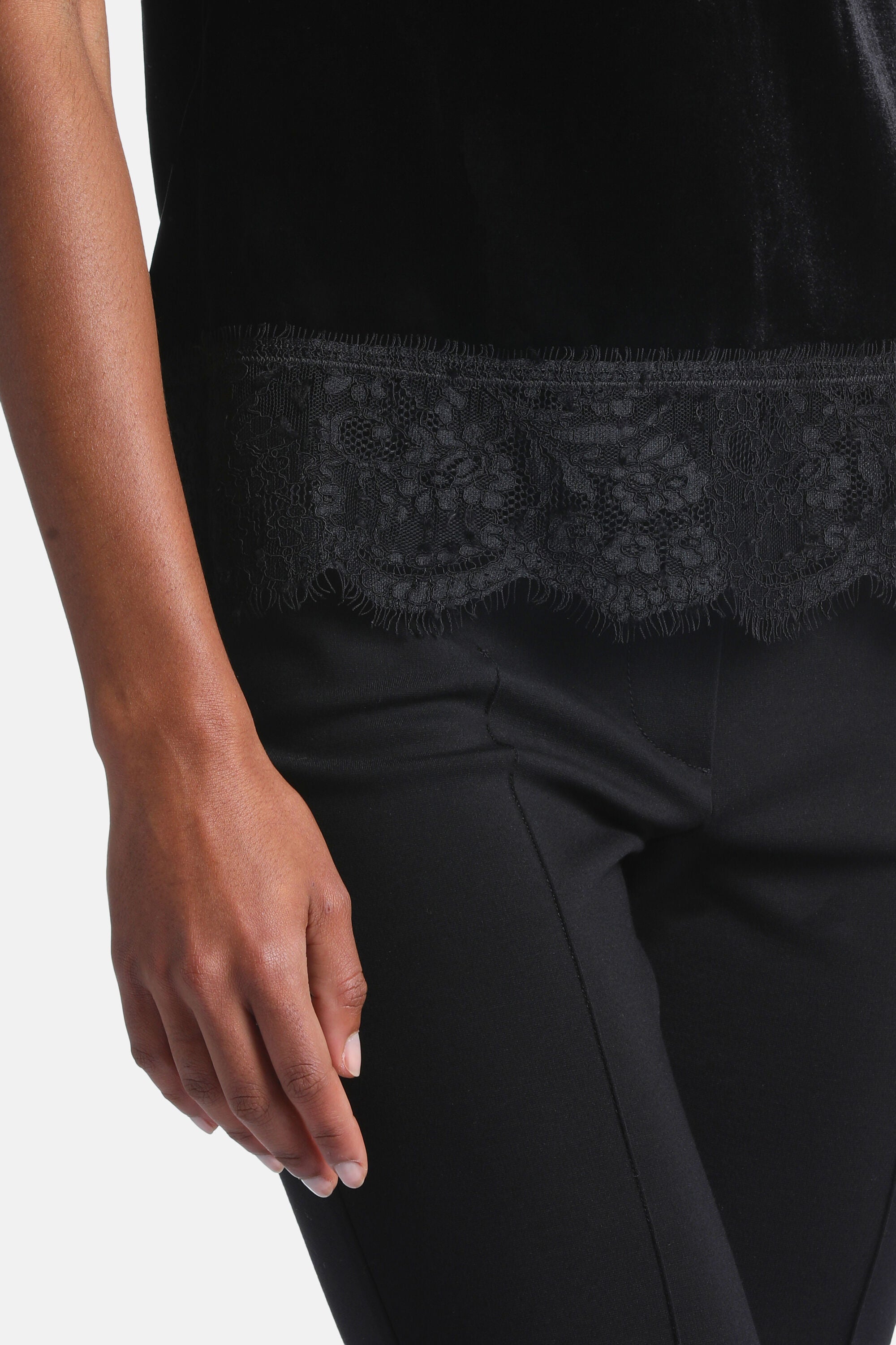 Black velvet top with a wide band of black floral lace at the hem, featuring a scalloped and fringed edge.