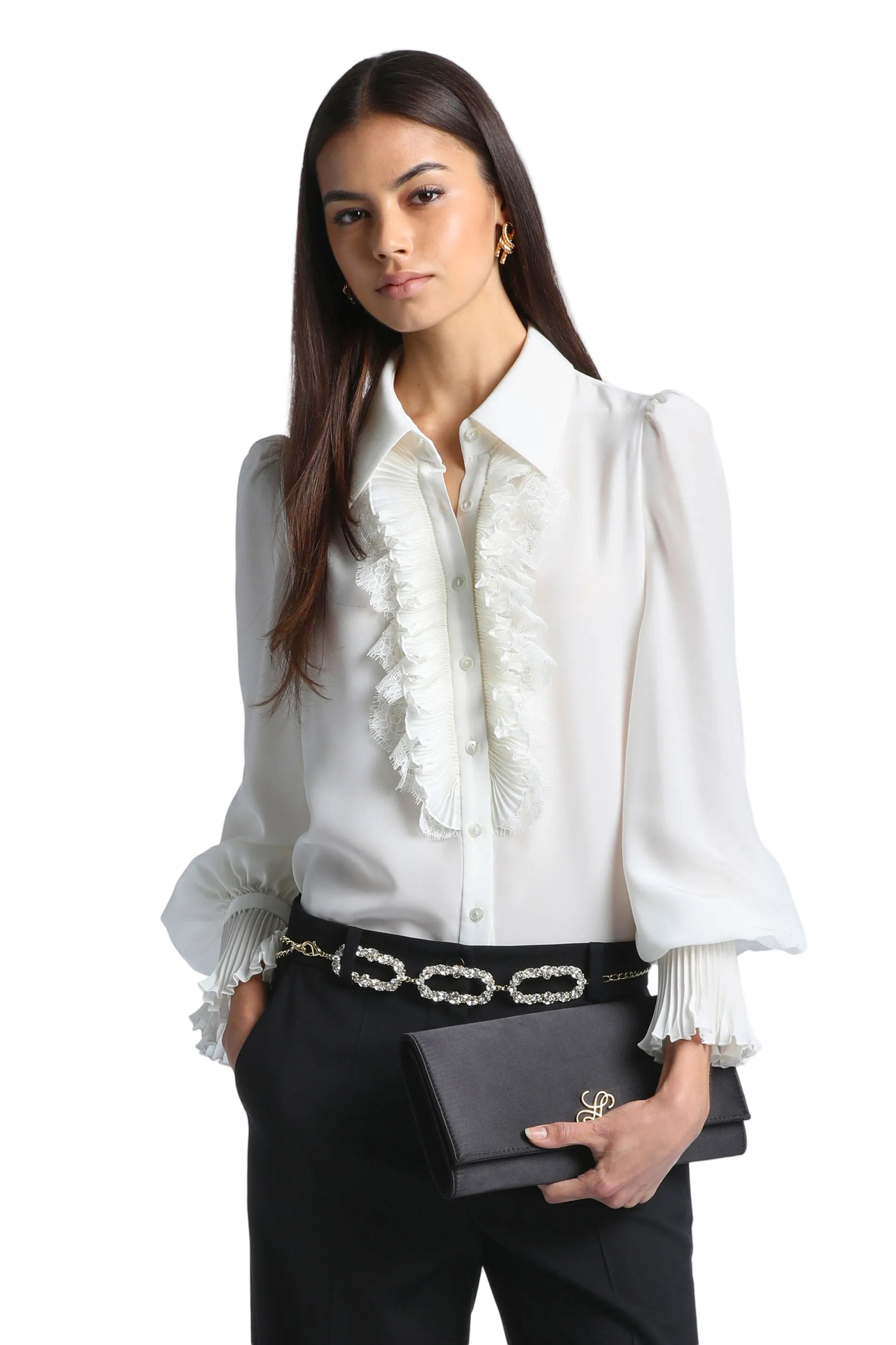 Ivory long-sleeved shirt with a pointed collar, ruffled front placket, and pleated cuffs.