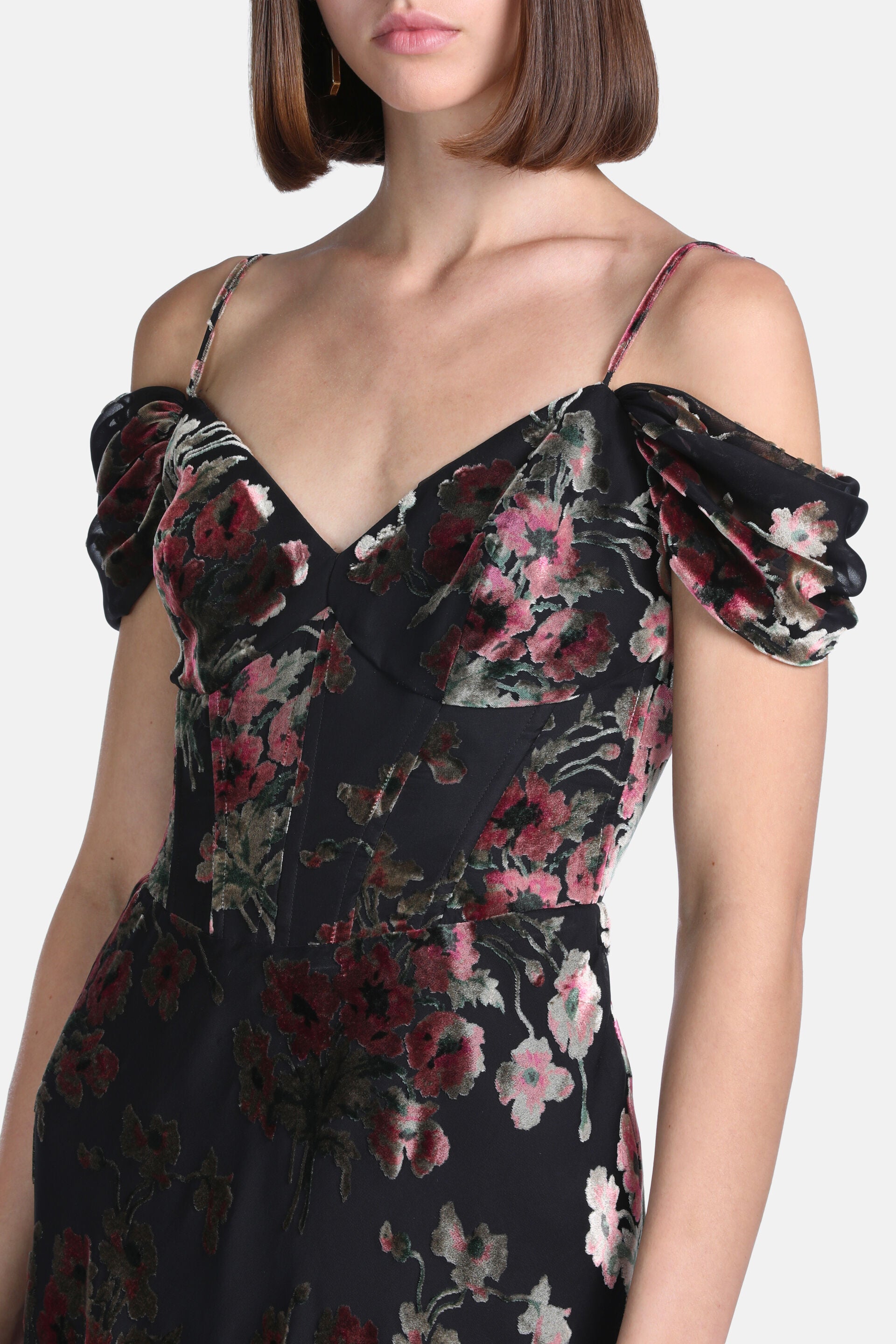 Black velvet burnout dress with pink and green floral pattern, V-neck, thin straps, off-shoulder puffed sleeves, and corset b