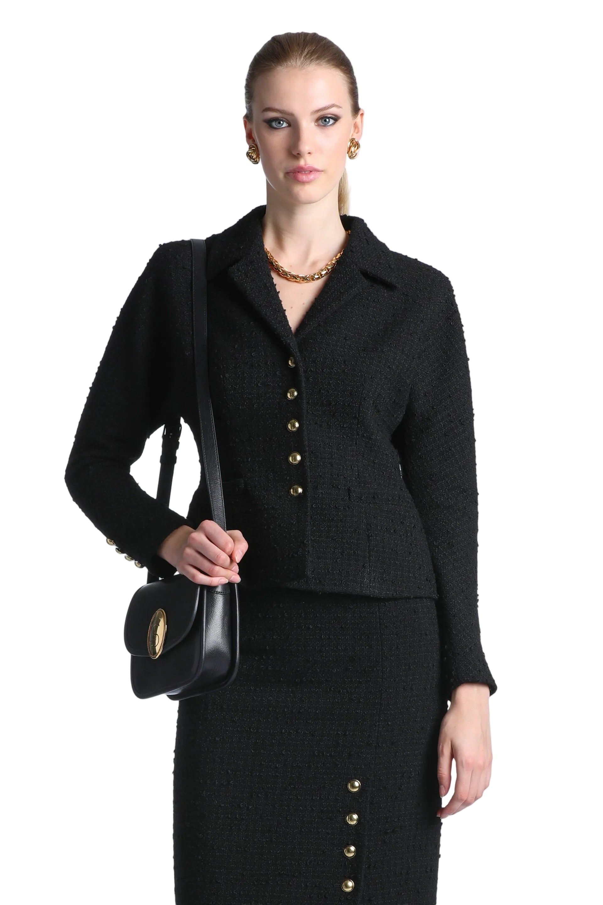Black tailored woven jacket with a classic collar, long sleeves, and gold-toned buttons on the front and cuffs.