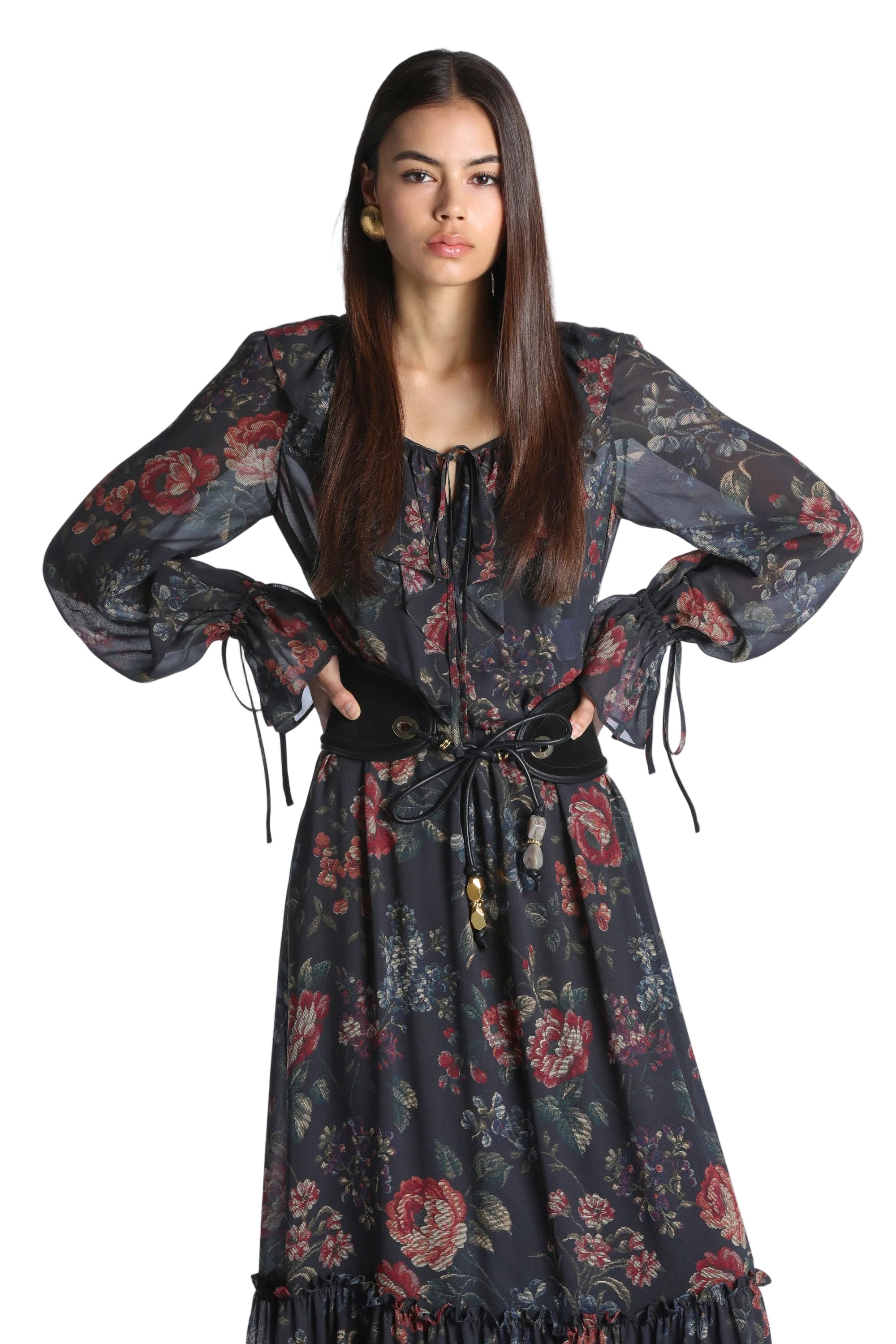 Brown floral maxi dress with a square tie-neck, sheer long sleeves with tie cuffs, a wide black belt, and a ruffled hem.