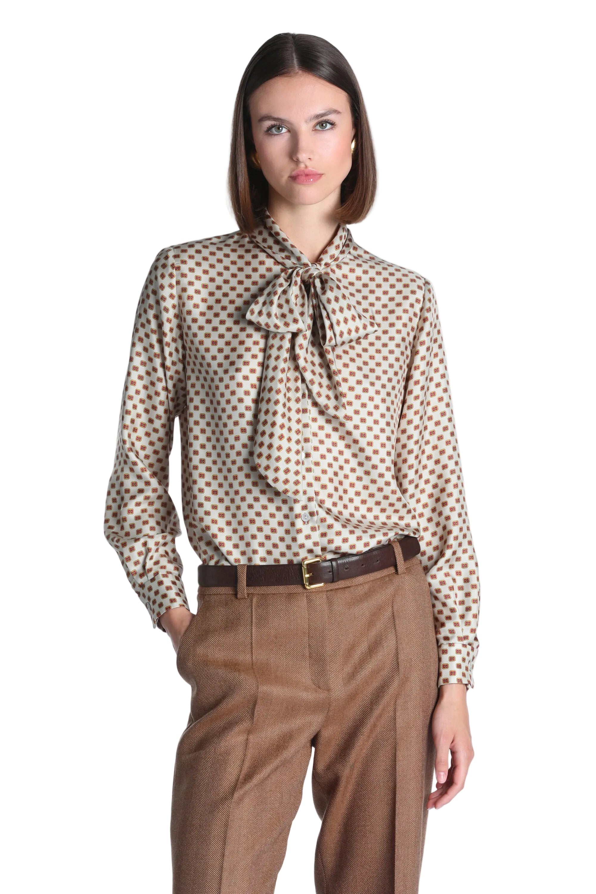 Cream and brown geometric patterned silk shirt with a pussy-bow neckline and long sleeves.