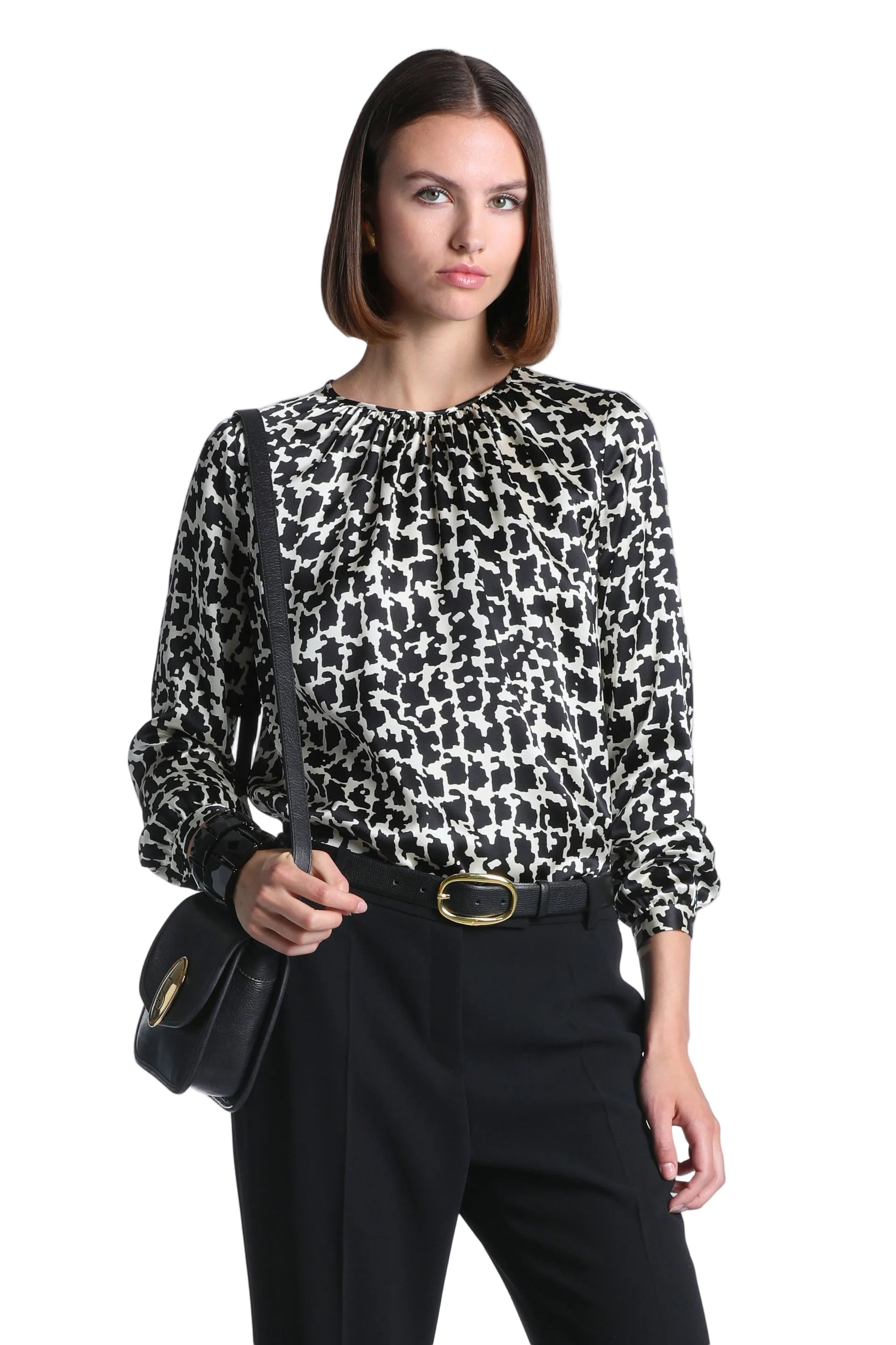 Black and cream abstract pattern long-sleeved shirt with gathered round neckline and cuffed sleeves.