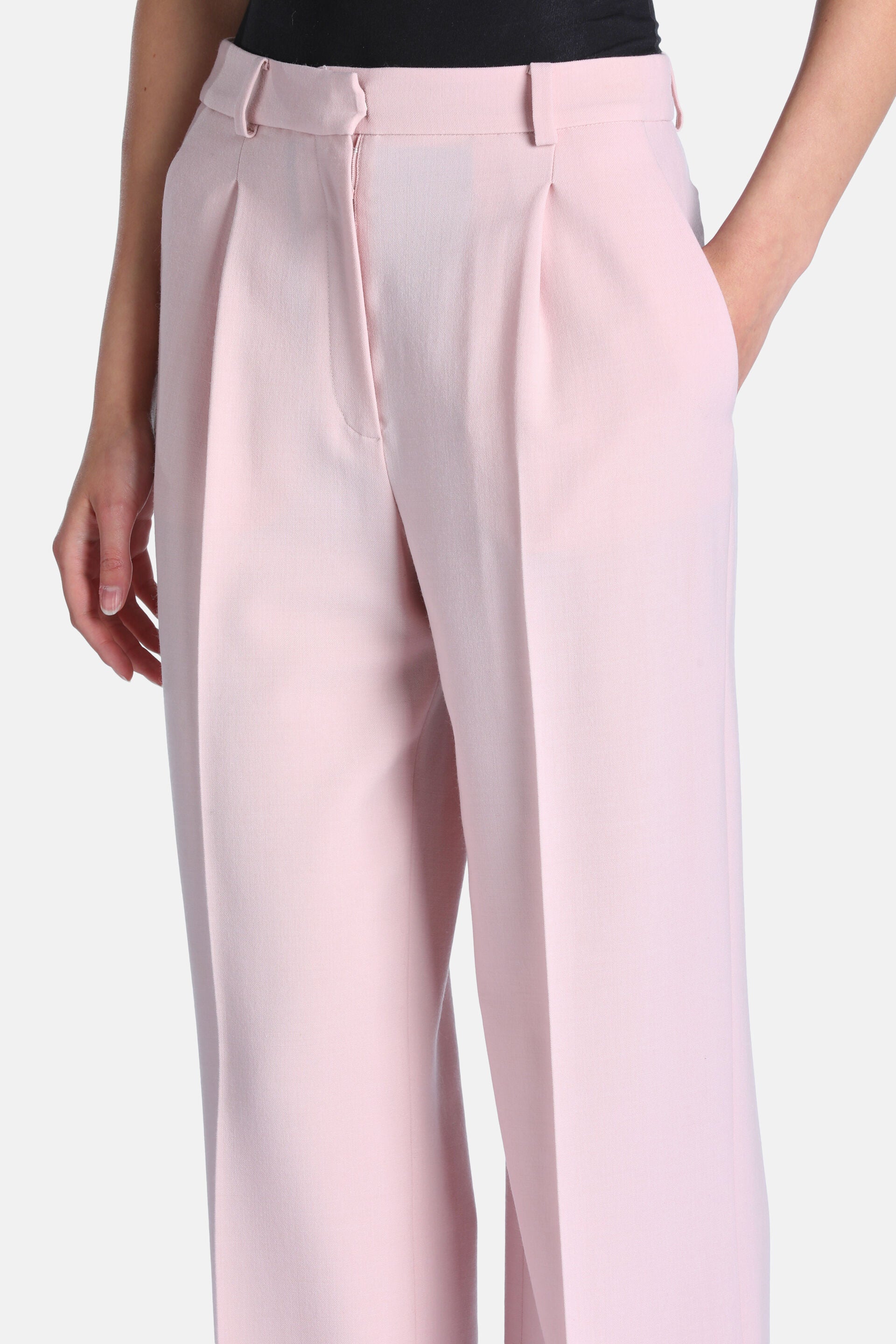 Light pink high-waisted trousers with belt loops, a hidden zip fly, single front pleats, and side pockets.