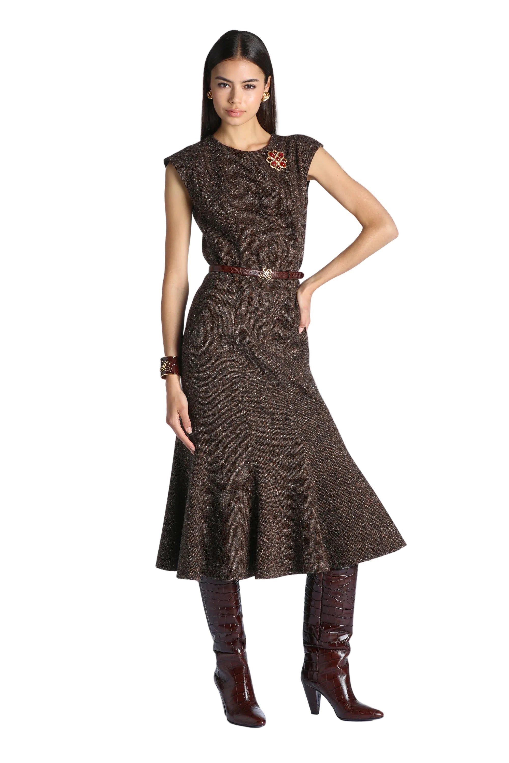 Brown tweed midi dress with cap sleeves, a fitted bodice, and a flared mermaid-style hem, worn with a thin brown belt.