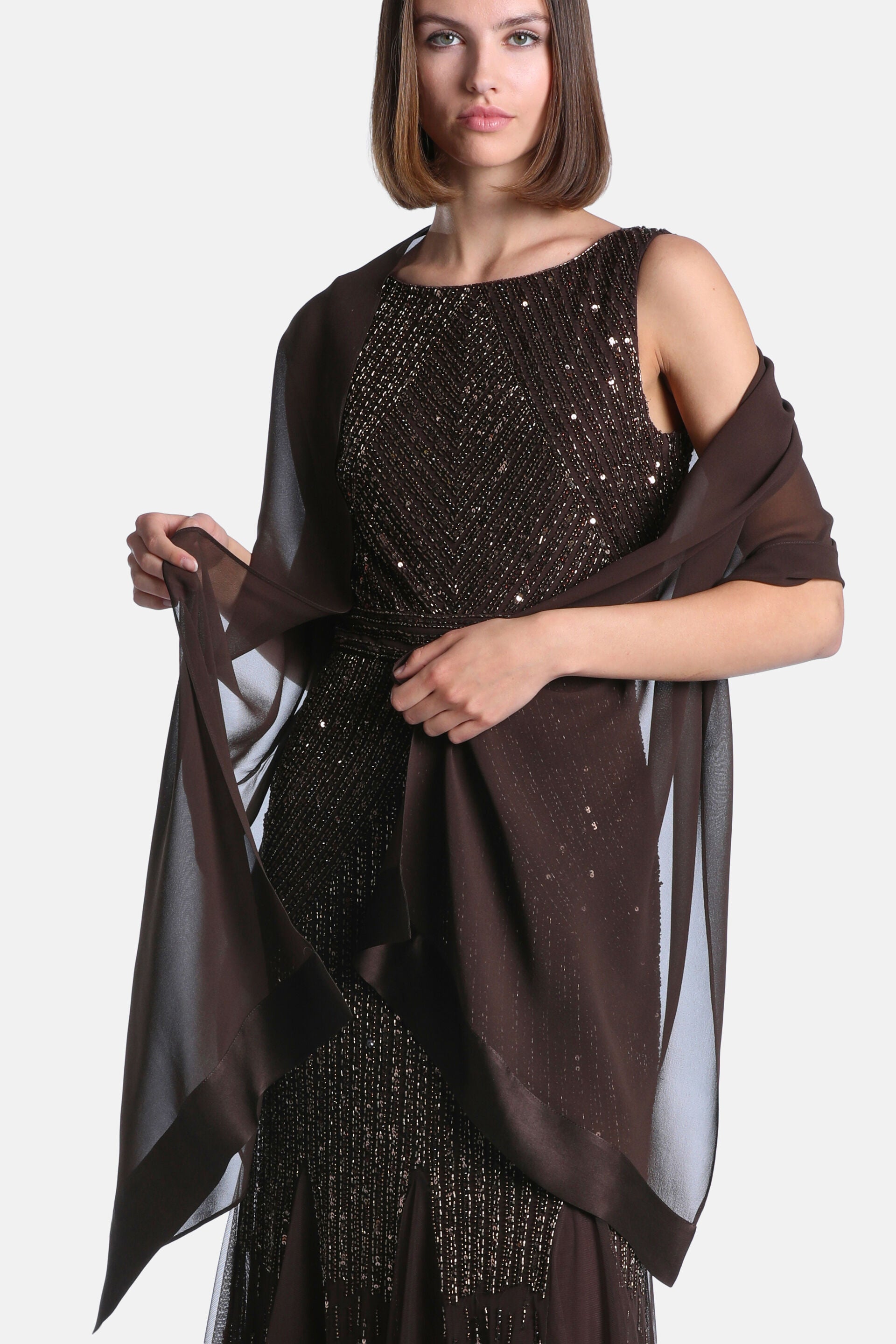 Dark brown sleeveless dress with bronze-toned sequins and beads in diagonal bodice patterns and vertical skirt patterns. Matc