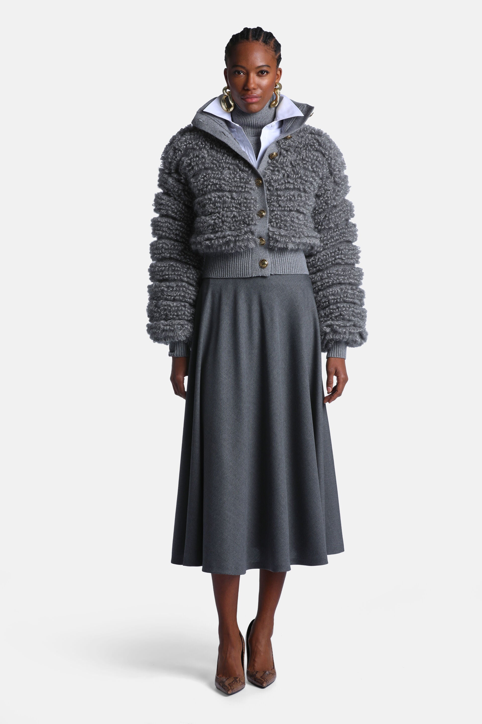 Greymelange midi A-line skirt in a smooth, flowing fabric with a simple design.