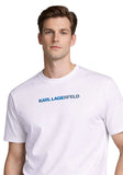 White crewneck t-shirt with short sleeves. "KARL LAGERFELD" printed on the chest in a blue gradient.