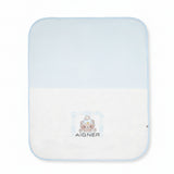 White and light blue baby blanket with rounded corners, featuring a cartoon bear wearing a hat and "AIGNER" logo.