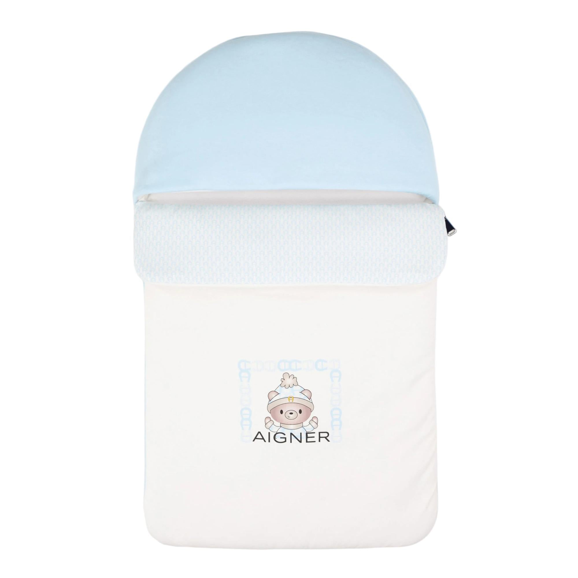 Aigner Kids baby nest in white and light blue with a bear graphic print and textured trim.