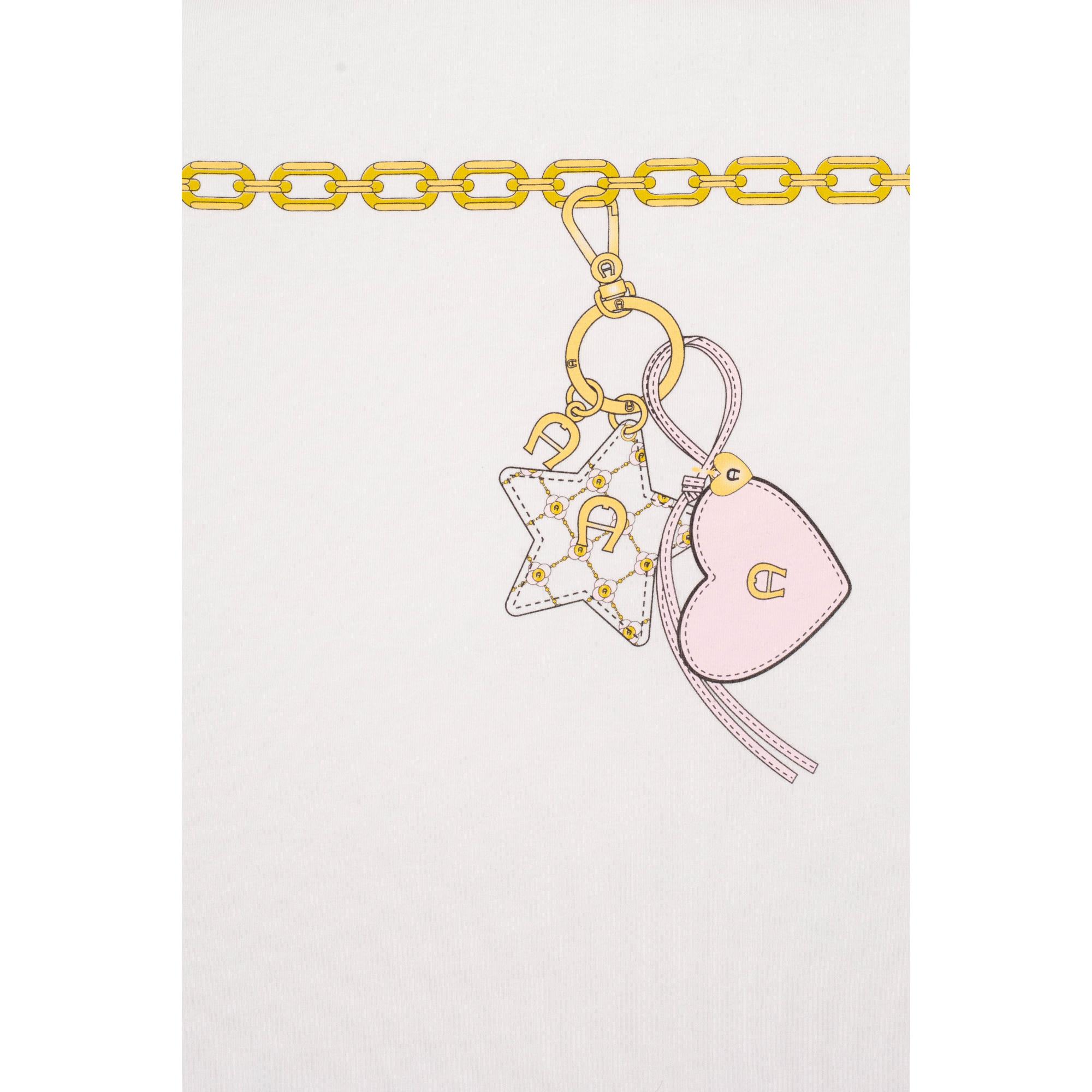 Beige fabric with a print of a gold-toned chain, clip, and two charms: a white star with chain pattern and a pink heart, both