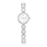 Swarovski Una MC watch with a round white dial, silver-toned case, and a bracelet featuring clear faceted stones.