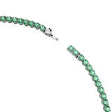Silver-toned tennis necklace with a continuous line of round, faceted green stones and an open tongue-and-groove clasp.