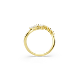 A gold-toned ring with a curved row of clear, faceted stones. The stones decrease in size from left to right.