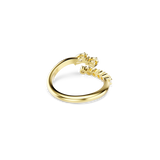 Gold-toned open ring with a cluster of clear faceted stones on one end and a line of smaller clear faceted stones on the othe