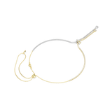 Two-tone necklace: half silver-toned, half gold-toned chain, both set with clear stones. Gold-toned knot slider clasp.