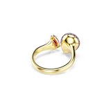 Gold-toned open ring with a pear-shaped red stone on one end and a dome-shaped end encircled with small pink stones.