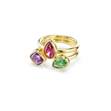 Set of three gold-toned rings with bezel-set stones: one purple cushion-cut, one pink pear-shaped, and one green pear-shaped.