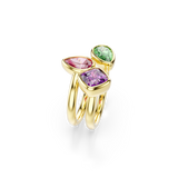Set of three gold-toned rings with bezel-set faceted gemstones: one pink pear, one purple square, and one green pear.