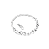 Silver-toned bracelet with one half of white stones and the other half a chain of S-shaped links. Detached infinity clasp.